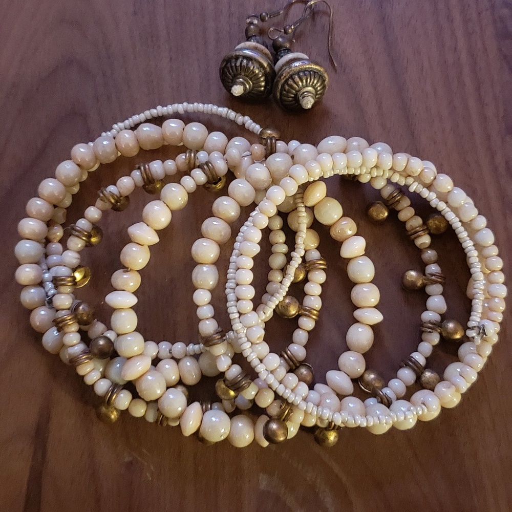 Puka shell bracelet and earrings.